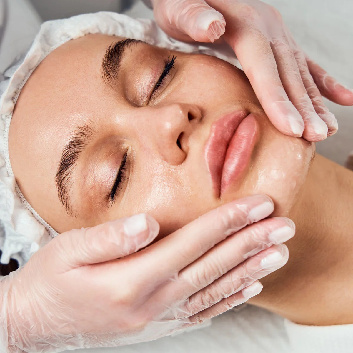 Close up woman getting a facial peel